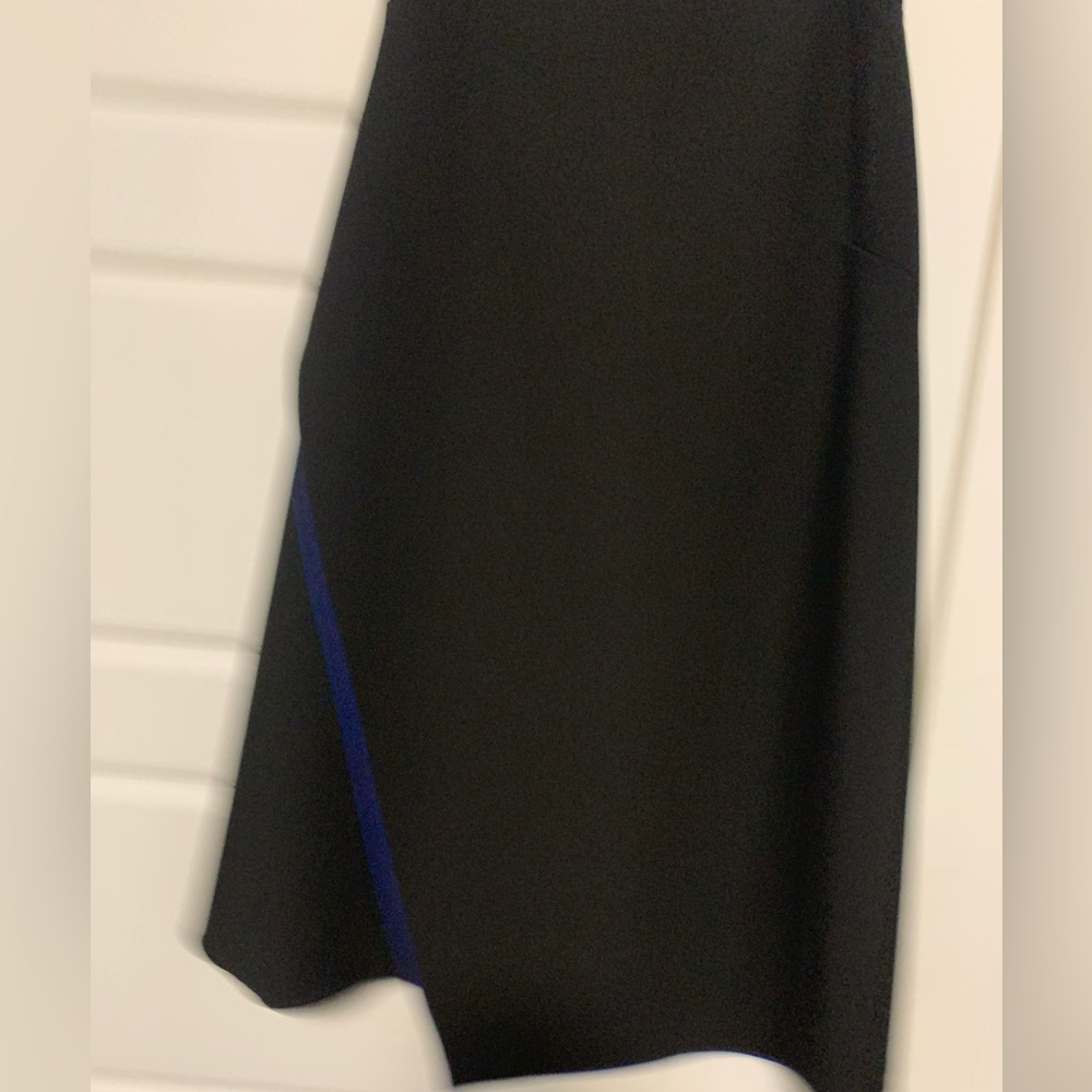 Hugo Boss black skirt with coordinating sweater. Worn once.